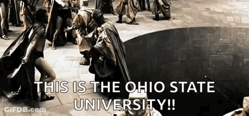 A Group Of People Are Standing Around A Circle With The Words This Is The Ohio State University Written On The Bottom . GIF