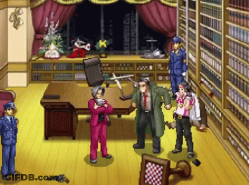 A Group Of People Are Standing Around A Desk In A Room With A K On The Window GIF