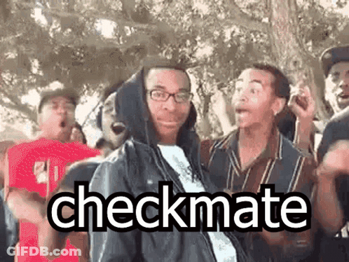 A Group Of People Are Standing Around A Man In A Hooded Jacket . GIF