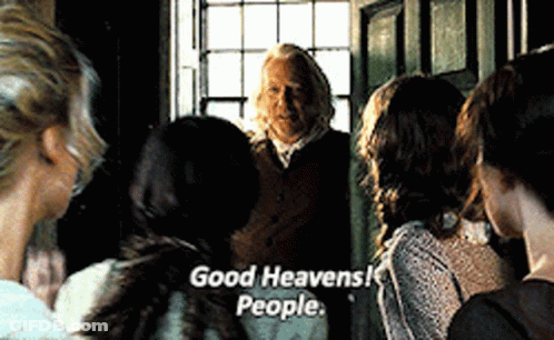 A Group Of People Are Standing Around A Man Who Is Talking To Them And The Words `` Good Heavens People '' Are On The Sc GIF
