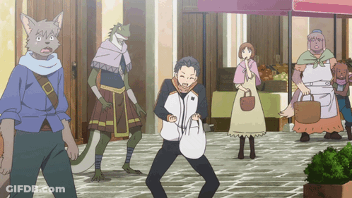 A Group Of People Are Standing Around A Man With A Bag On His Back GIF