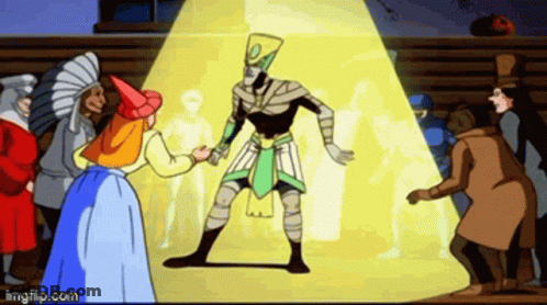 A Group Of People Are Standing Around A Statue Of A Man In A Cartoon . GIF