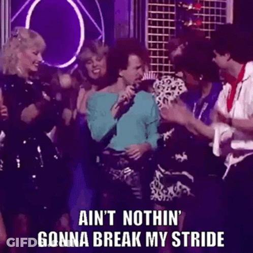 People Around Woman Singing With Microphone GIF
