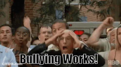 A Group Of People Are Standing In A Crowd With Their Hands On Their Heads And Bullying Works Written On The Screen . GIF
