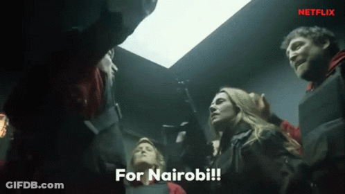 A Group Of People Are Standing In A Dark Room With The Words For Nairobi Written On The Bottom GIF