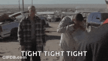 A Group Of People Are Standing In A Field With The Words Tight Tight Tight Written On The Bottom . GIF