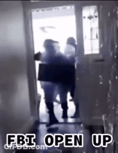 A Group Of People Are Standing In A Hallway With The Words Fbi Open Up On The Bottom GIF