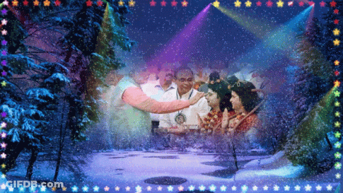 A Group Of People Are Standing In A Snowy Forest Surrounded By Lights GIF