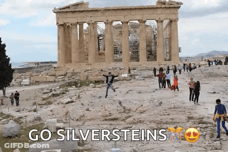 A Group Of People Are Standing In Front Of A Building With The Words Go Silversteins Written On The Bottom GIF