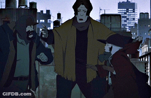 A Group Of People Are Standing In Front Of A City Skyline At Night GIF