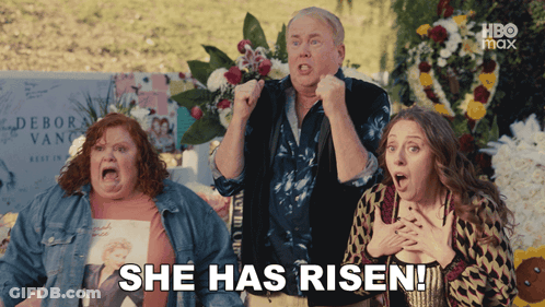 A Group Of People Are Standing In Front Of A Grave With The Words She Has Risen Written On It GIF