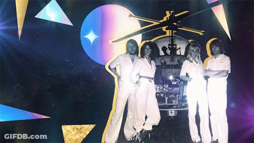 A Group Of People Are Standing In Front Of A Helicopter With The Number 62 On It GIF
