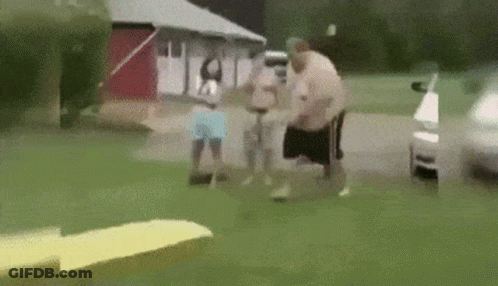 A Group Of People Are Standing In Front Of A House And A Car . GIF