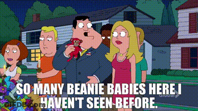 A Group Of People Are Standing In Front Of A House And A Man Is Holding A Stuffed Animal . GIF