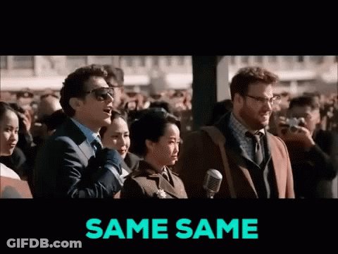 A Group Of People Are Standing In Front Of A Microphone And The Words Same Same Are On The Screen GIF