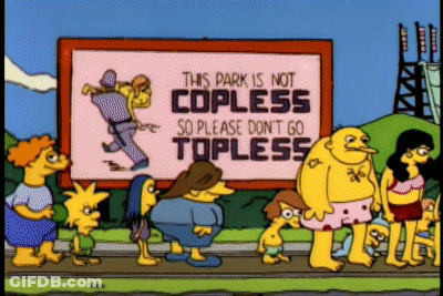A Group Of People Are Standing In Front Of A Sign That Says This Park Is Not Copless So Please Don T Go Topless GIF