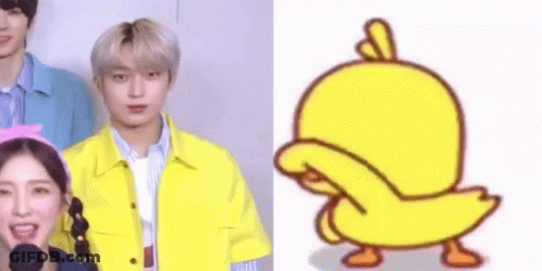 A Group Of People Are Standing Next To Each Other And A Cartoon Duck Is Standing Next To Them . GIF