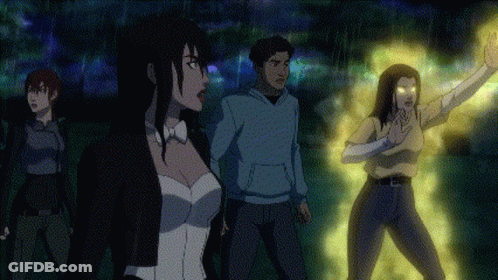 A Group Of People Are Standing Next To Each Other And One Of Them Is Glowing Yellow GIF