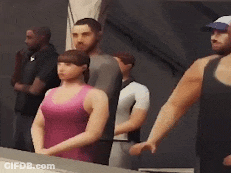 A Group Of People Are Standing Next To Each Other In A Room GIF