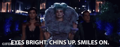 A Group Of People Are Standing Next To Each Other With The Words `` Eyes Bright , Chins Up , Smiles On '' . GIF