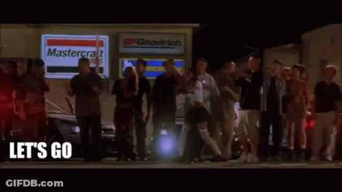 A Group Of People Are Standing Outside Of A Mastercraft Store GIF