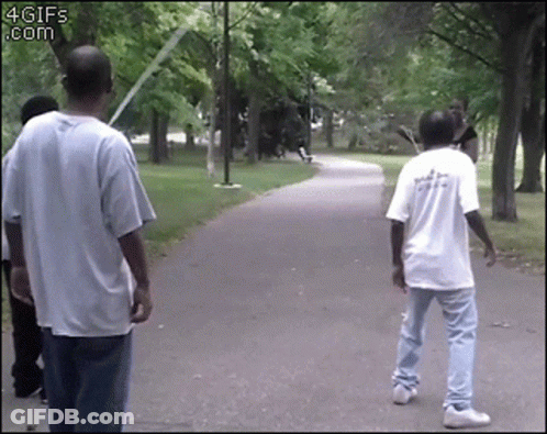 A Group Of People Are Walking Down A Path With A 4Gifs.com Watermark In The Corner GIF