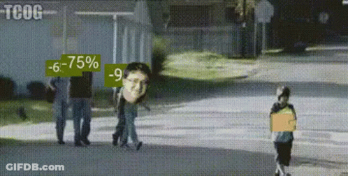 A Group Of People Are Walking Down A Street With A Sign That Says -75 % On It GIF