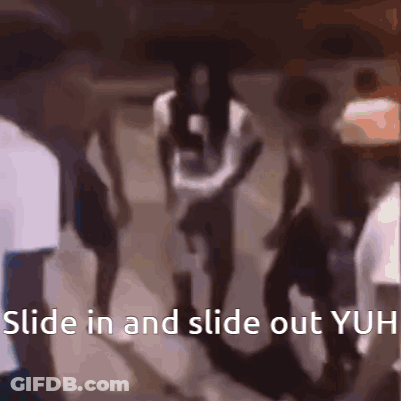 A Group Of People Are Walking In A Dark Room With The Words Slide In And Slide Out Yuh Written On The Bottom GIF