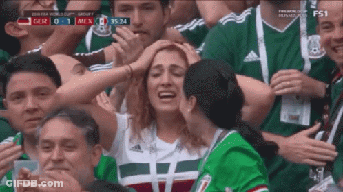 A Group Of People Are Watching A Soccer Game With The Score Being 0-1 GIF