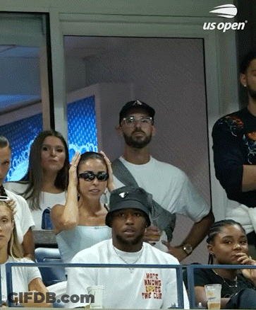 A Group Of People Are Watching A Tennis Match Sponsored By Us Open . GIF