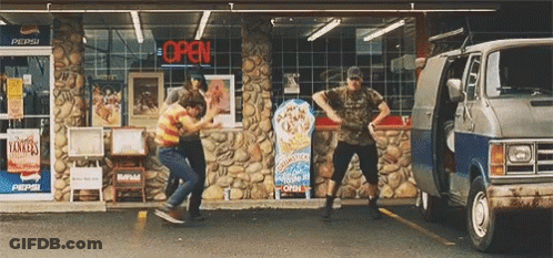A Group Of People Dancing In Front Of A Pepsi Store GIF