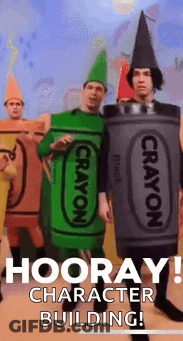 A Group Of People Dressed In Crayon Costumes Are Standing In Front Of A Building That Says Hooray ! Character Building ! GIF