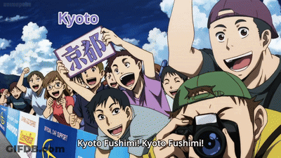 A Group Of People Holding A Sign That Says Kyoto On It GIF
