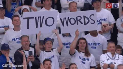 A Group Of People Holding Up A Sign That Says " Two Words " GIF