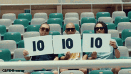 A Group Of People Holding Up Signs That Say 10 10 10 GIF