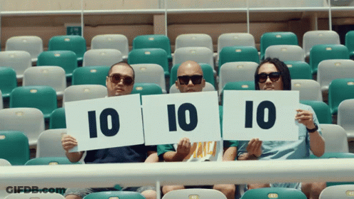 A Group Of People Holding Up Signs That Say 10 GIF