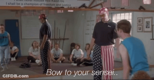 A Group Of People In A Gym With The Words Bow To Your Sensei Written On The Bottom GIF
