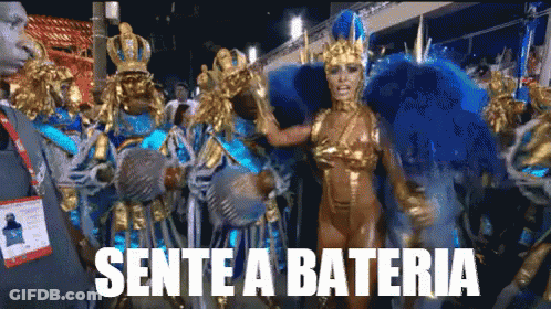A Group Of People In Colorful Costumes With The Words Sente A Bateria Written Below Them GIF