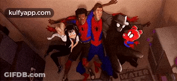 A Group Of People In Spiderman Costumes Are Standing Next To Each Other . GIF