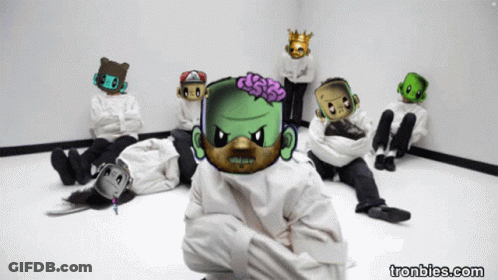 A Group Of People In Straitjackets With Cartoon Faces On Them And The Website Tronbies.com GIF