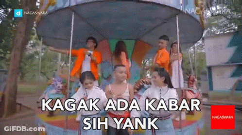 People On Merry Go Round With Text GIF