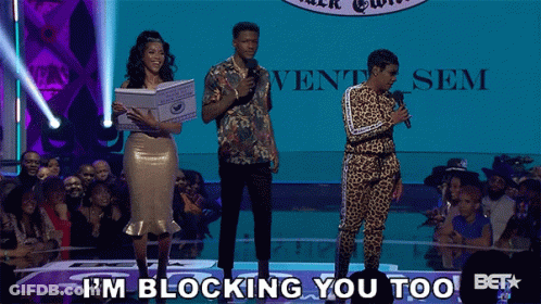 A Group Of People On A Stage With The Words I 'M Blocking You Too GIF
