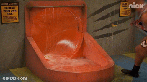 A Group Of People On A Water Slide With The Nick Logo In The Corner GIF
