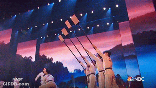 A Group Of People Performing On A Stage With Nbc Written On The Bottom GIF