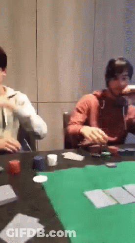 A Group Of People Playing A Game Of Poker GIF