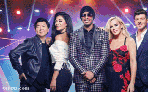 A Group Of People Posing For A Picture With One Wearing Sunglasses GIF