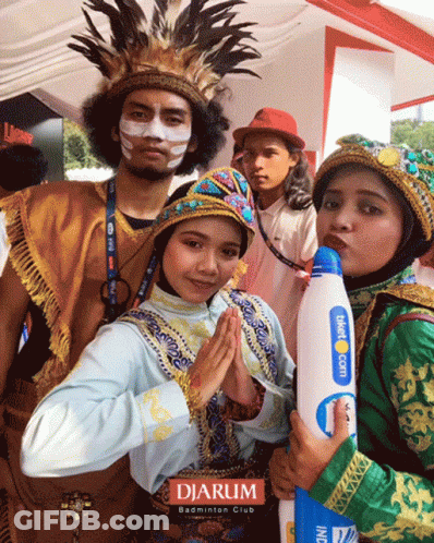 A Group Of People Posing For A Picture With The Word Djarum In The Corner GIF