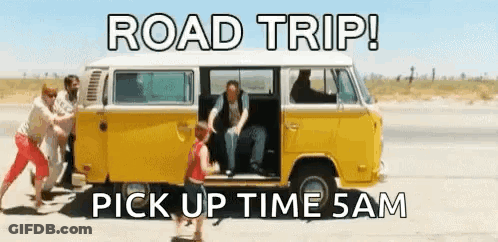 A Group Of People Pushing A Yellow Van Down A Road With The Words Road Trip Pick Up Time 5Am GIF