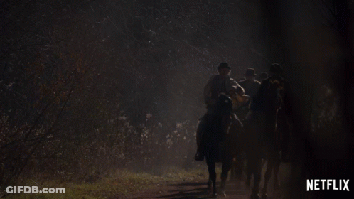 A Group Of People Riding Horses With A Netflix Logo In The Corner GIF