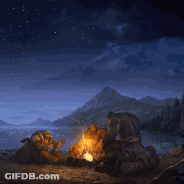 A Group Of People Sitting Around A Campfire With A Mountain In The Background GIF
